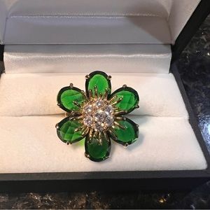 Green rhinestone flower ring.
